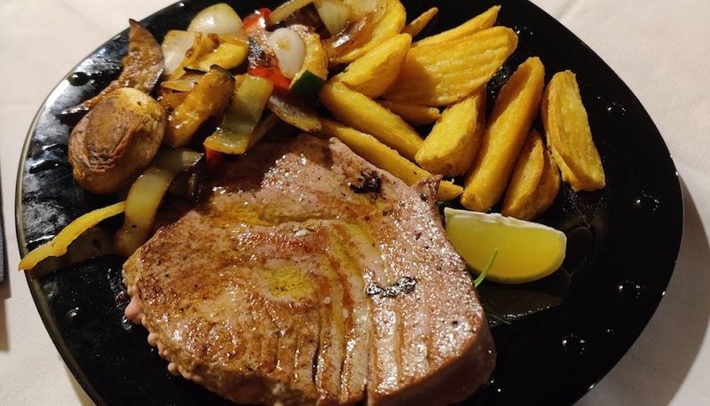 Grilled meat with fries